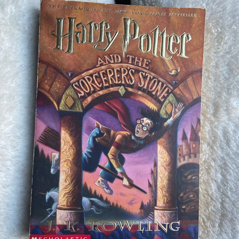 Scholastic Harry Potter Book with Purple and Gold Cover